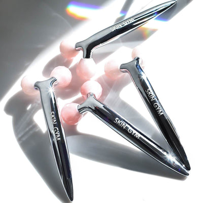 Roller de belleza de cuarzo rosa Skin Gym Revi