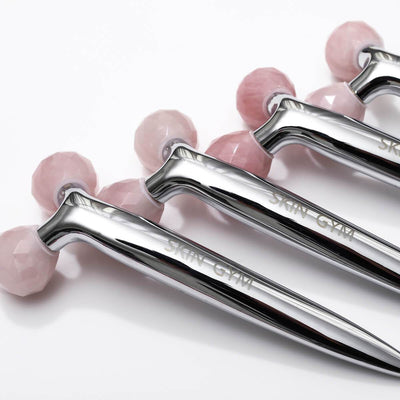 Roller de belleza de cuarzo rosa Skin Gym Revi